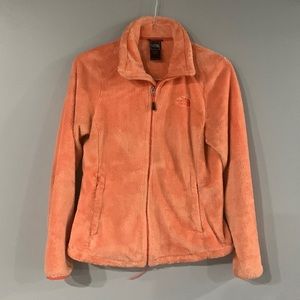 North Face Plush zip up. Women’s medium. Color, soft orange.